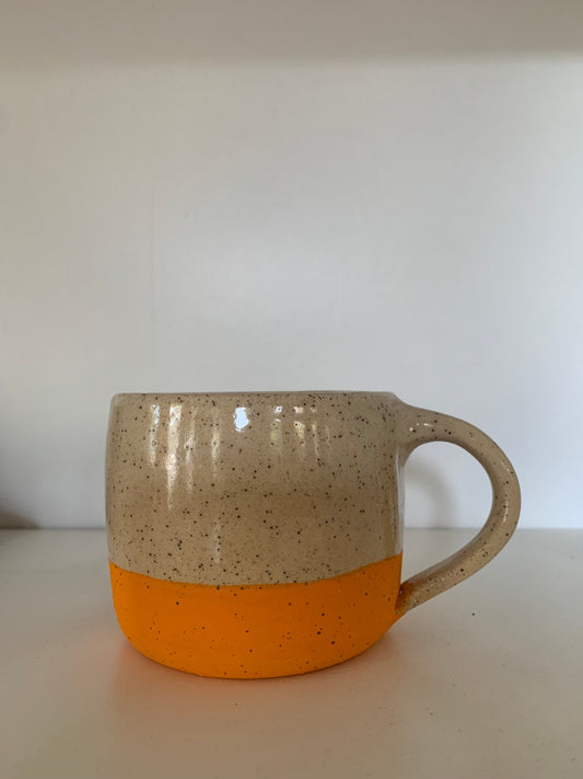 Orange & tan speckled mug with handle