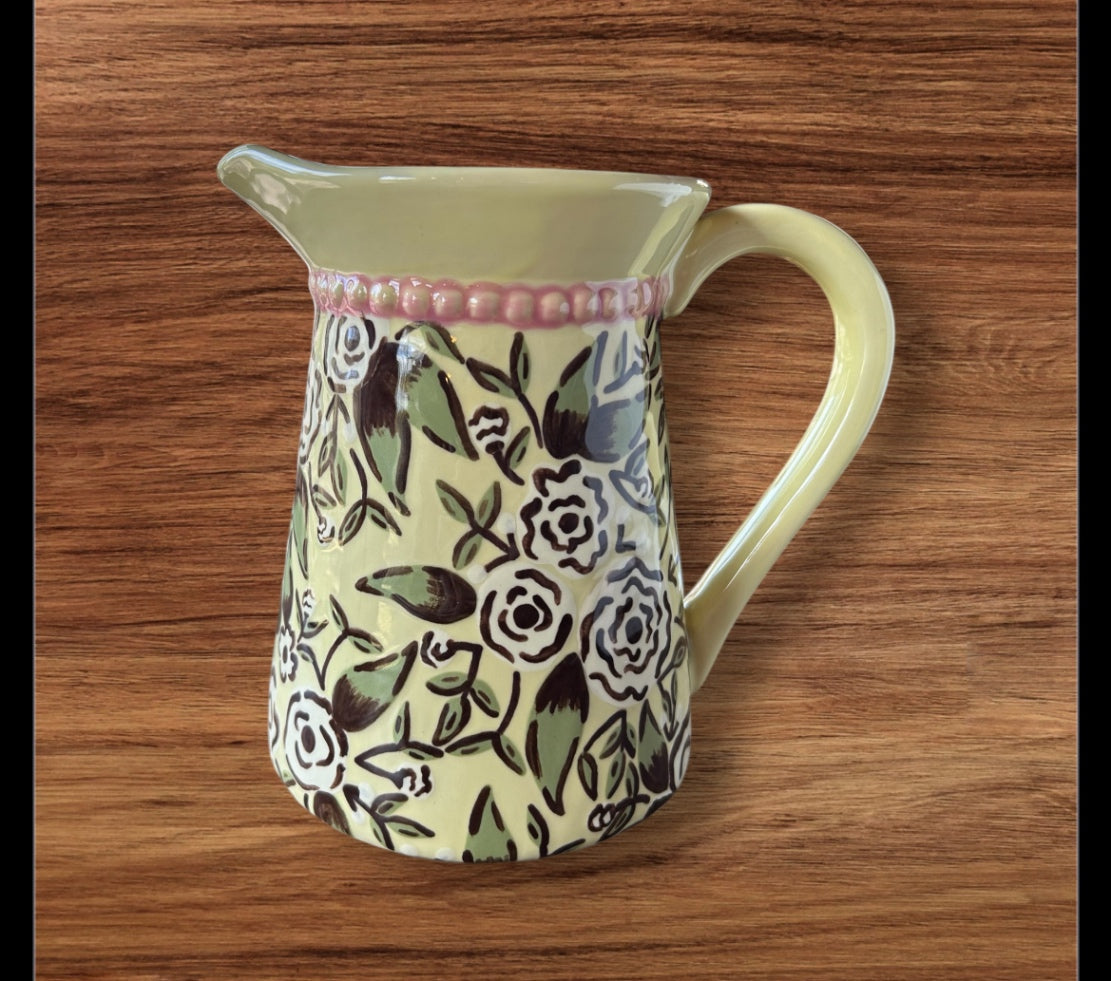 Yellow floral pitcher